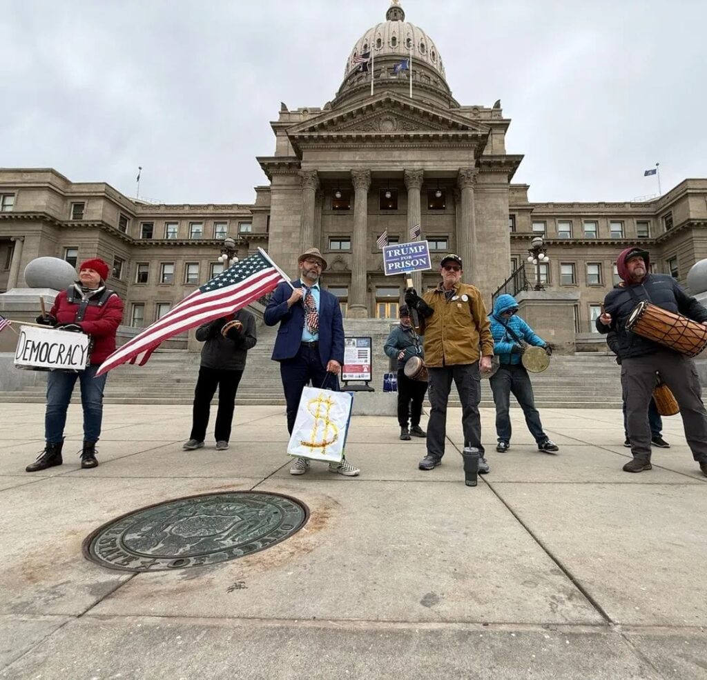 Joe Turmes and fellow demonstrators in front of the Idaho State Capito